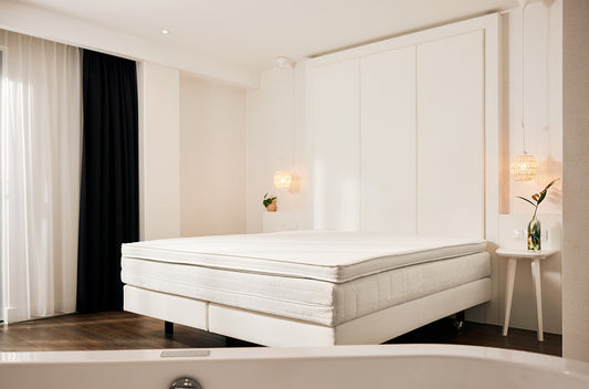 Opbouw Van der Valk bed. Van der Valk boxspring, matras en topper